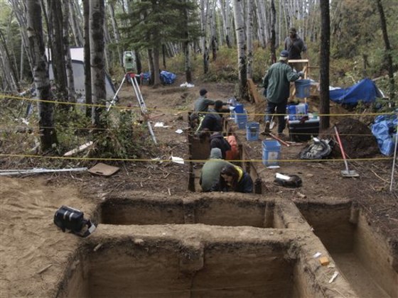 This undated photo shows a trench connecting both areas of the site discovered in Alaska. Some 11,500 years ago one of America's earliest families laid the remains of a 3-year-old child to rest in their home in what is now Alaska.